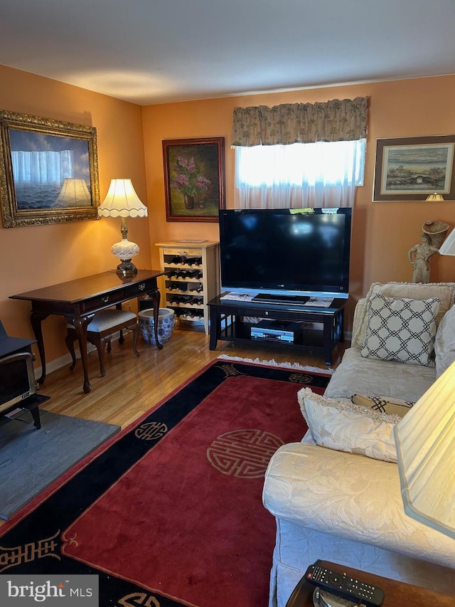 9221 Greenhouse Cir, Nottingham, MD 21236 - living area featuring wood finished floors