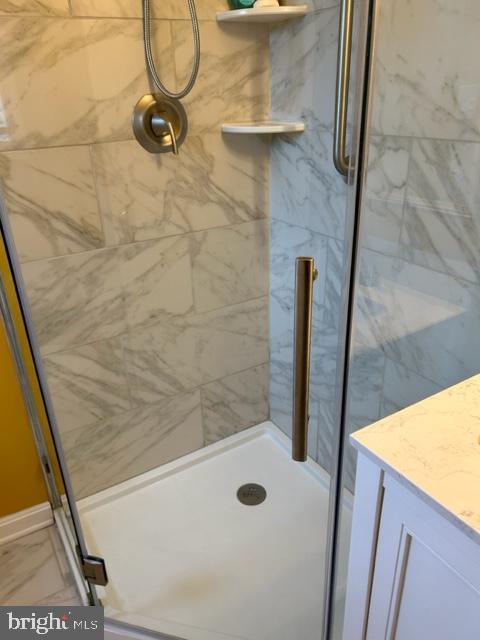 9221 Greenhouse Cir, Nottingham, MD 21236 - bathroom with a stall shower and vanity
