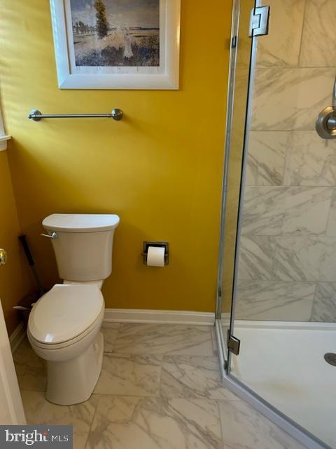9221 Greenhouse Cir, Nottingham, MD 21236 - full bathroom featuring marble finish flooring and a shower stall