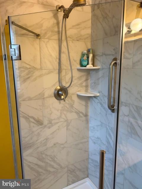 bathroom featuring walk in shower