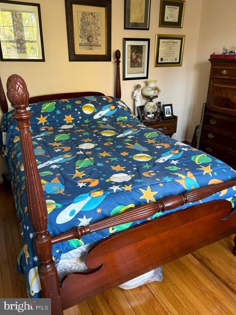 bedroom featuring hardwood / wood-style floors