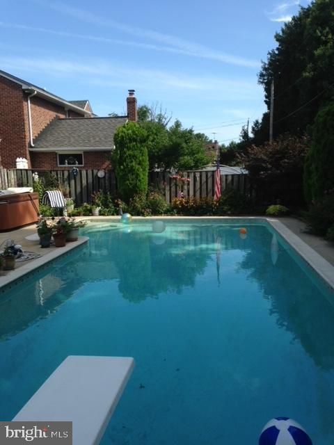 9221 Greenhouse Cir, Nottingham, MD 21236 - view of pool featuring a diving board