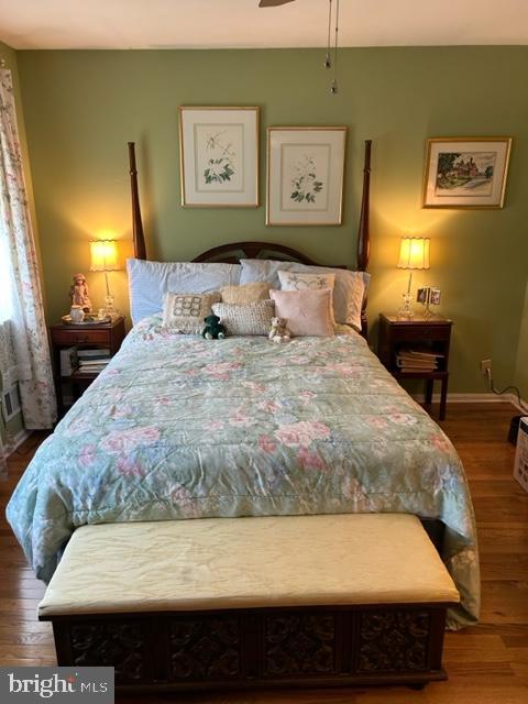 bedroom featuring hardwood / wood-style flooring