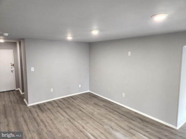 basement with wood-type flooring