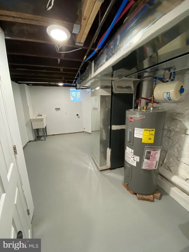 365 Union Aly, Pottstown, PA 19464 - basement featuring water heater and a sink