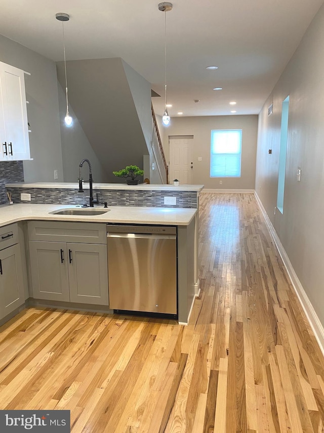 365 Union Aly, Pottstown, PA 19464 - kitchen featuring dishwasher, a sink, gray cabinets, light wood-type flooring, and open floor plan