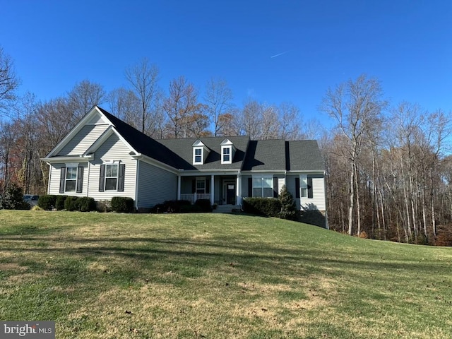 new england style home featuring a front yard