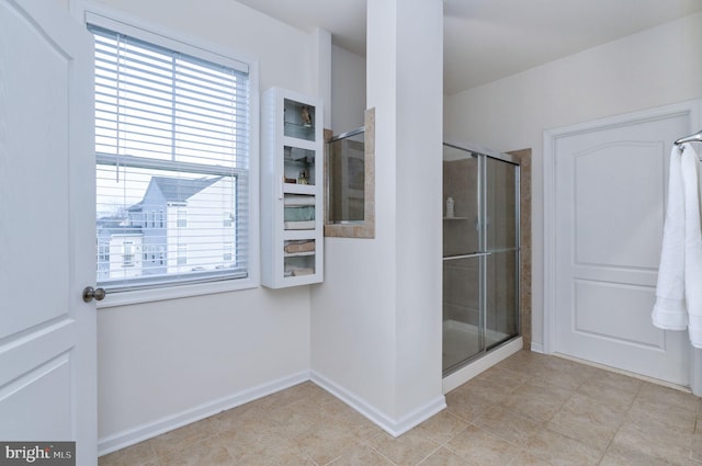 bathroom featuring walk in shower