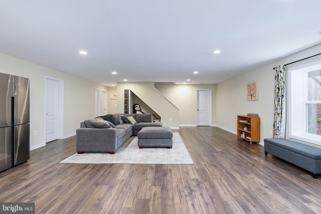 living room featuring dark hardwood / wood-style flooring