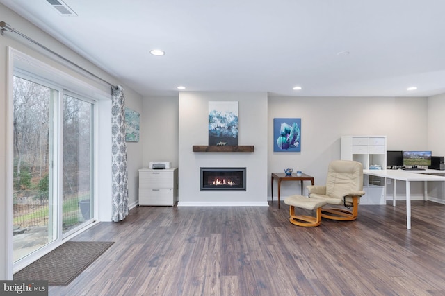 living area featuring dark hardwood / wood-style flooring