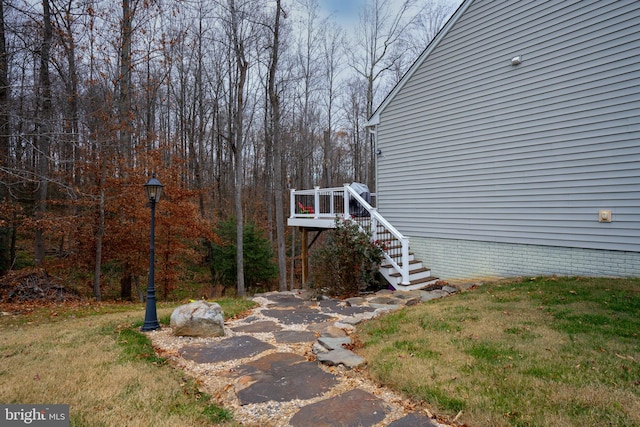 exterior space featuring a wooden deck