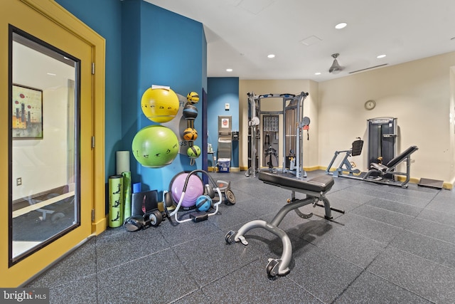 exercise room featuring ceiling fan