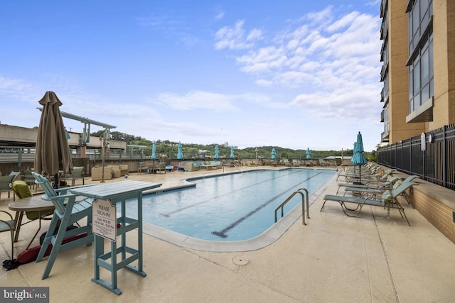 view of pool featuring a patio area