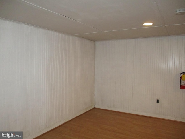 spare room featuring hardwood / wood-style flooring