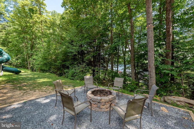 view of patio featuring a fire pit