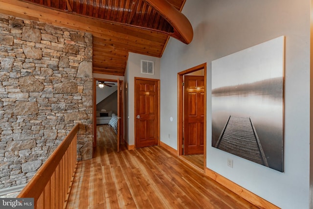 hall featuring light hardwood / wood-style floors, high vaulted ceiling, and wood ceiling