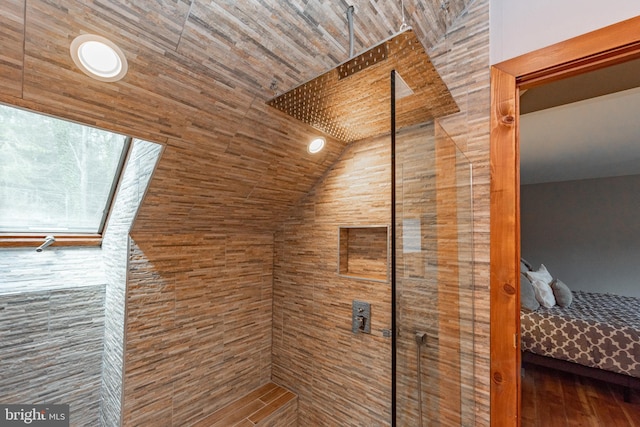 interior space featuring walk in shower, wood ceiling, vaulted ceiling, and hardwood / wood-style flooring