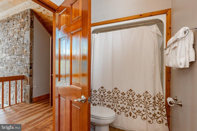 bathroom with wood-type flooring, vaulted ceiling, toilet, and wooden ceiling