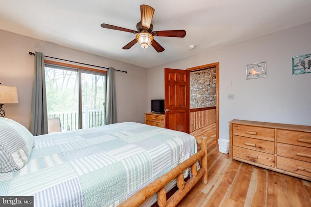 bedroom featuring ceiling fan, light wood-type flooring, and access to outside