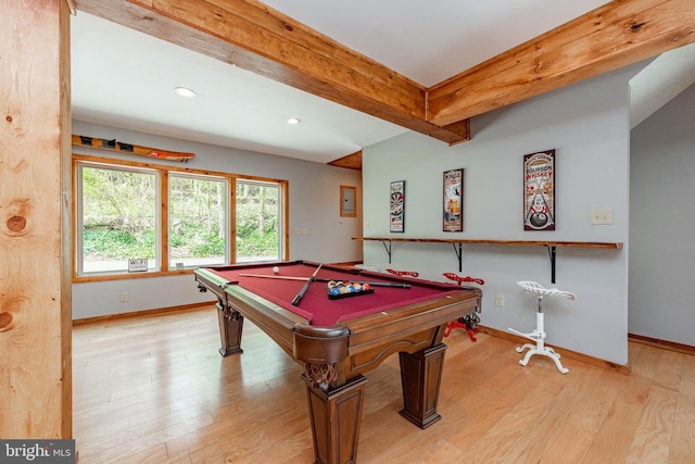 game room with light hardwood / wood-style flooring, beamed ceiling, and billiards