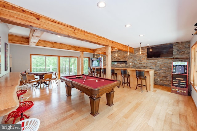 playroom with beamed ceiling, light wood-type flooring, billiards, and indoor bar