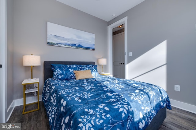 bedroom featuring dark hardwood / wood-style floors