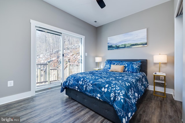 bedroom featuring access to exterior, ceiling fan, and dark hardwood / wood-style floors