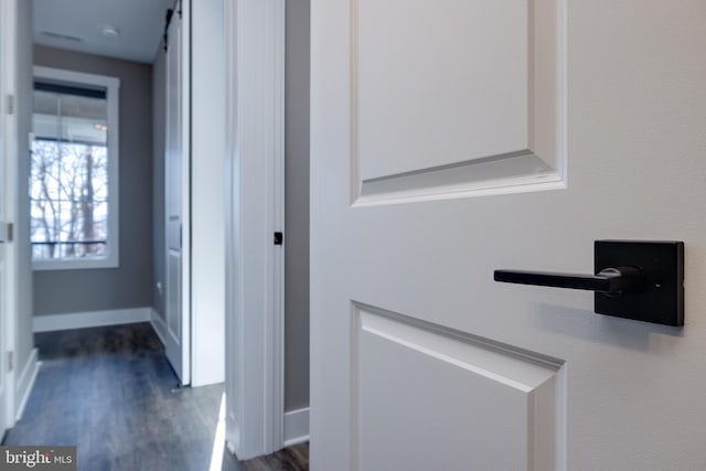 hall featuring dark hardwood / wood-style floors