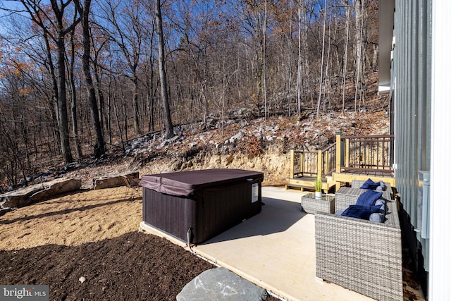 view of patio / terrace featuring a hot tub