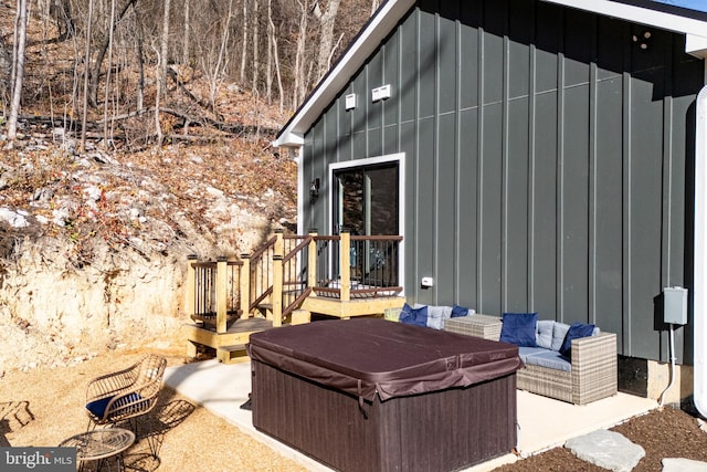 view of patio with a hot tub