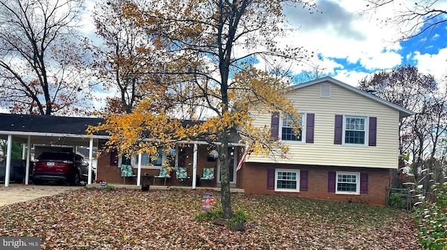 view of front facade with a carport