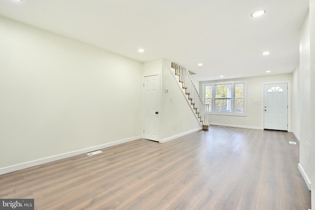 interior space with hardwood / wood-style flooring