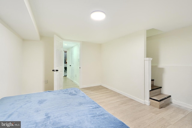 interior space featuring light wood-type flooring and washer / clothes dryer