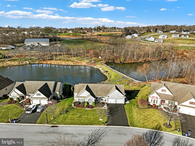 birds eye view of property featuring a water view