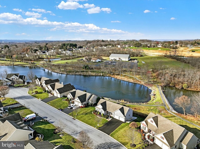 drone / aerial view with a water view