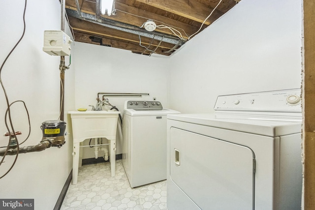 laundry area featuring washing machine and dryer