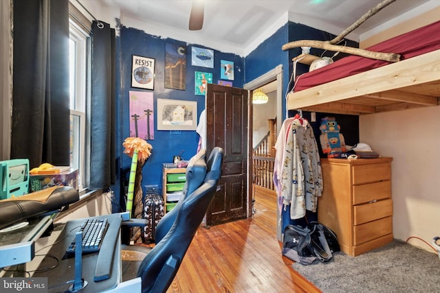 bedroom featuring hardwood / wood-style flooring