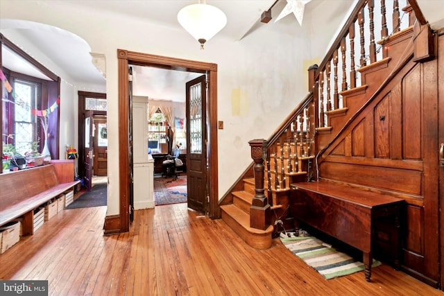 foyer entrance with light hardwood / wood-style floors