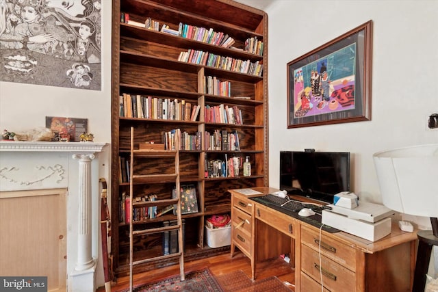 office space with dark hardwood / wood-style floors