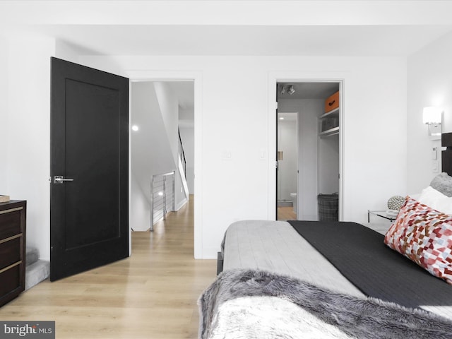 bedroom featuring light wood-type flooring