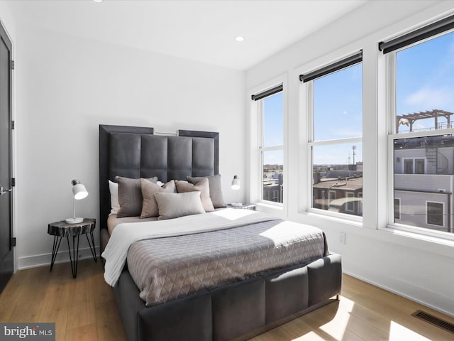 bedroom featuring hardwood / wood-style floors