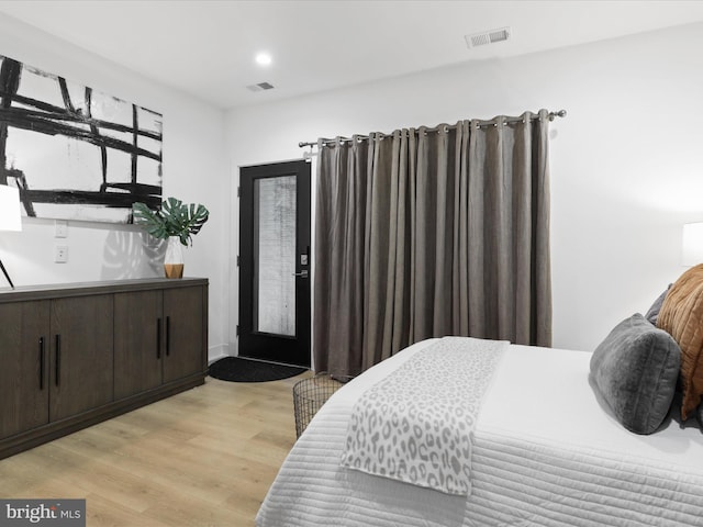 bedroom featuring light hardwood / wood-style floors