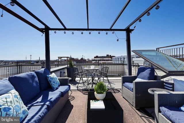 view of patio / terrace featuring a pergola and an outdoor living space