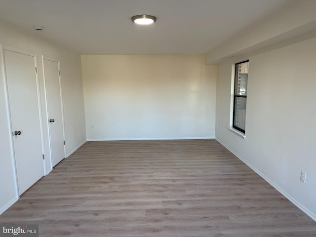 empty room featuring light hardwood / wood-style floors