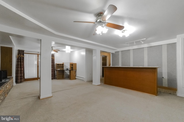 unfurnished living room with light carpet and a baseboard radiator