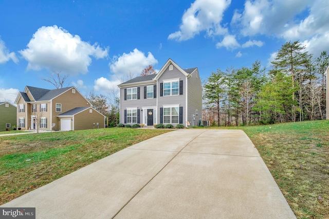 view of front of property with central AC and a front lawn