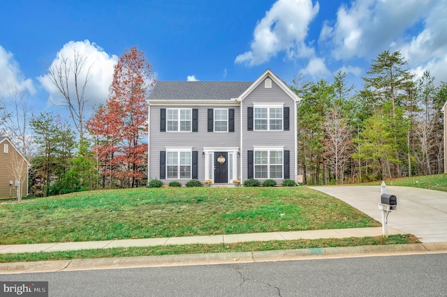 view of front of home featuring a front yard