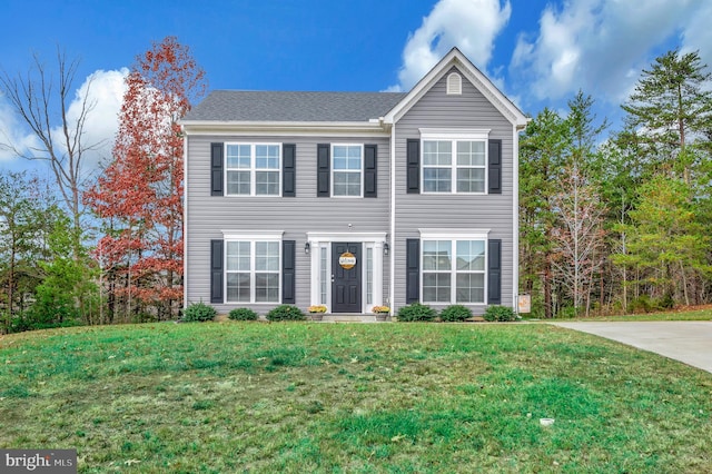 view of front facade with a front lawn