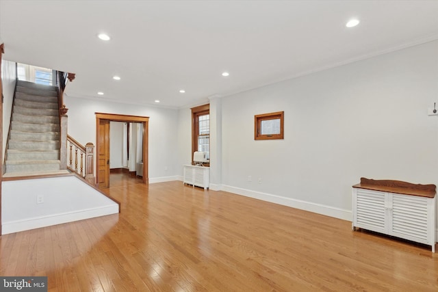 unfurnished living room with light hardwood / wood-style flooring