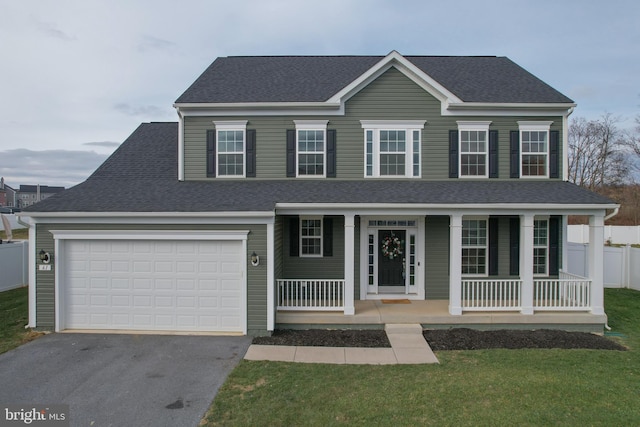 view of front facade with a porch and a front yard